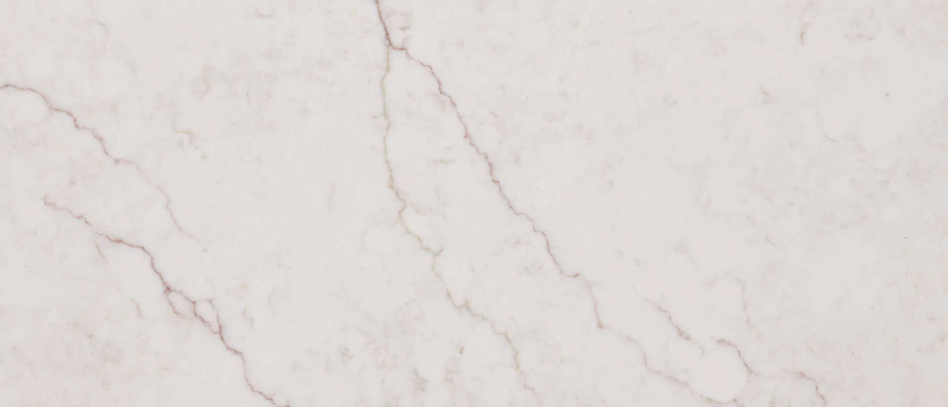 Closeup image of Q Quartz Calacatta Miraggio Sienna White Quartz countertop slab