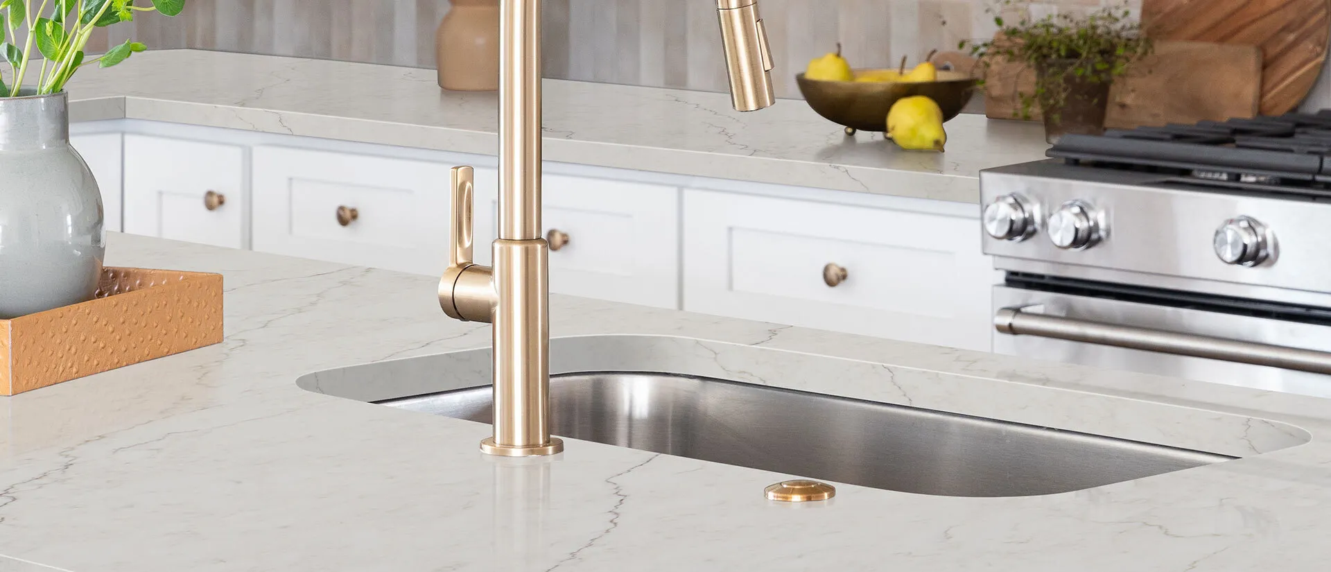 Image of installed Q Quartz Calacatta Miraggio Sienna White Quartz countertops