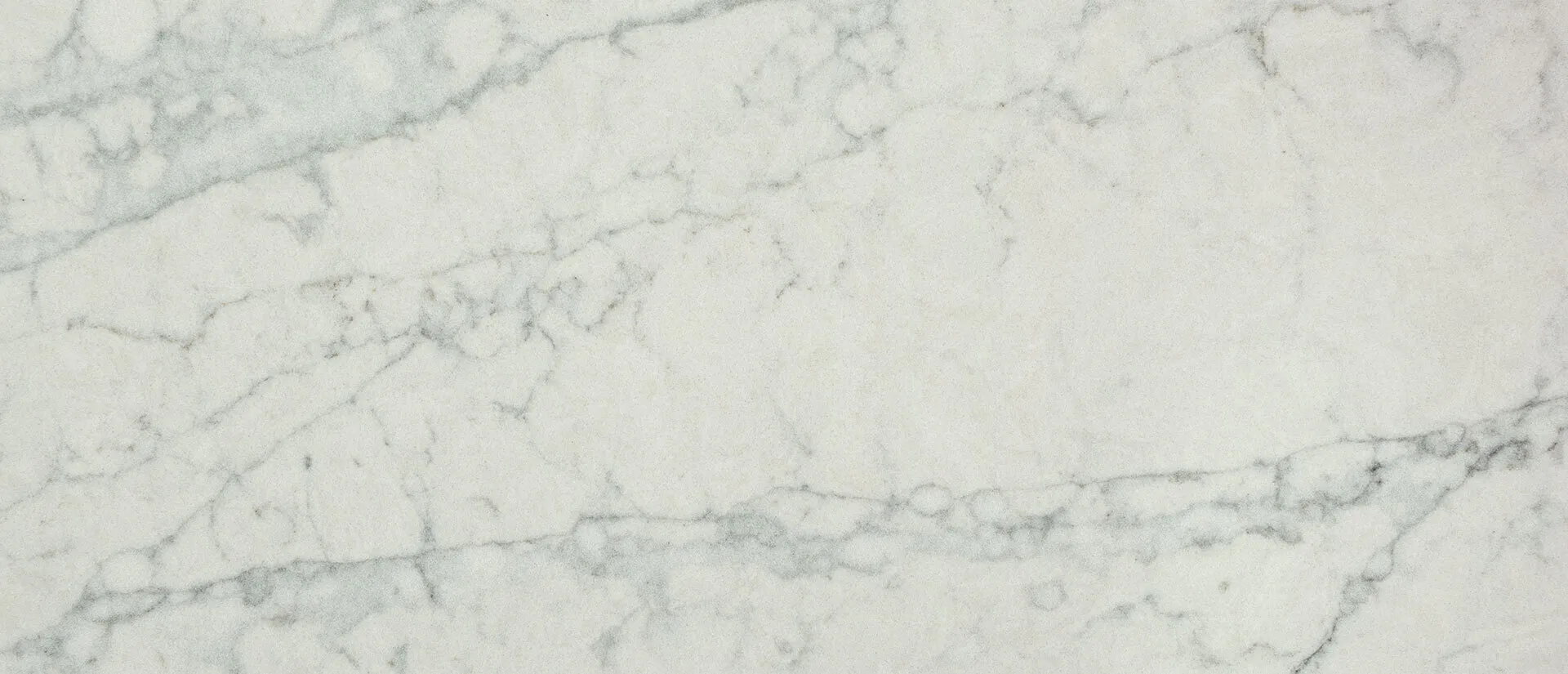 Closeup image of Q Quartz Azurmatt White Quartz countertop slab