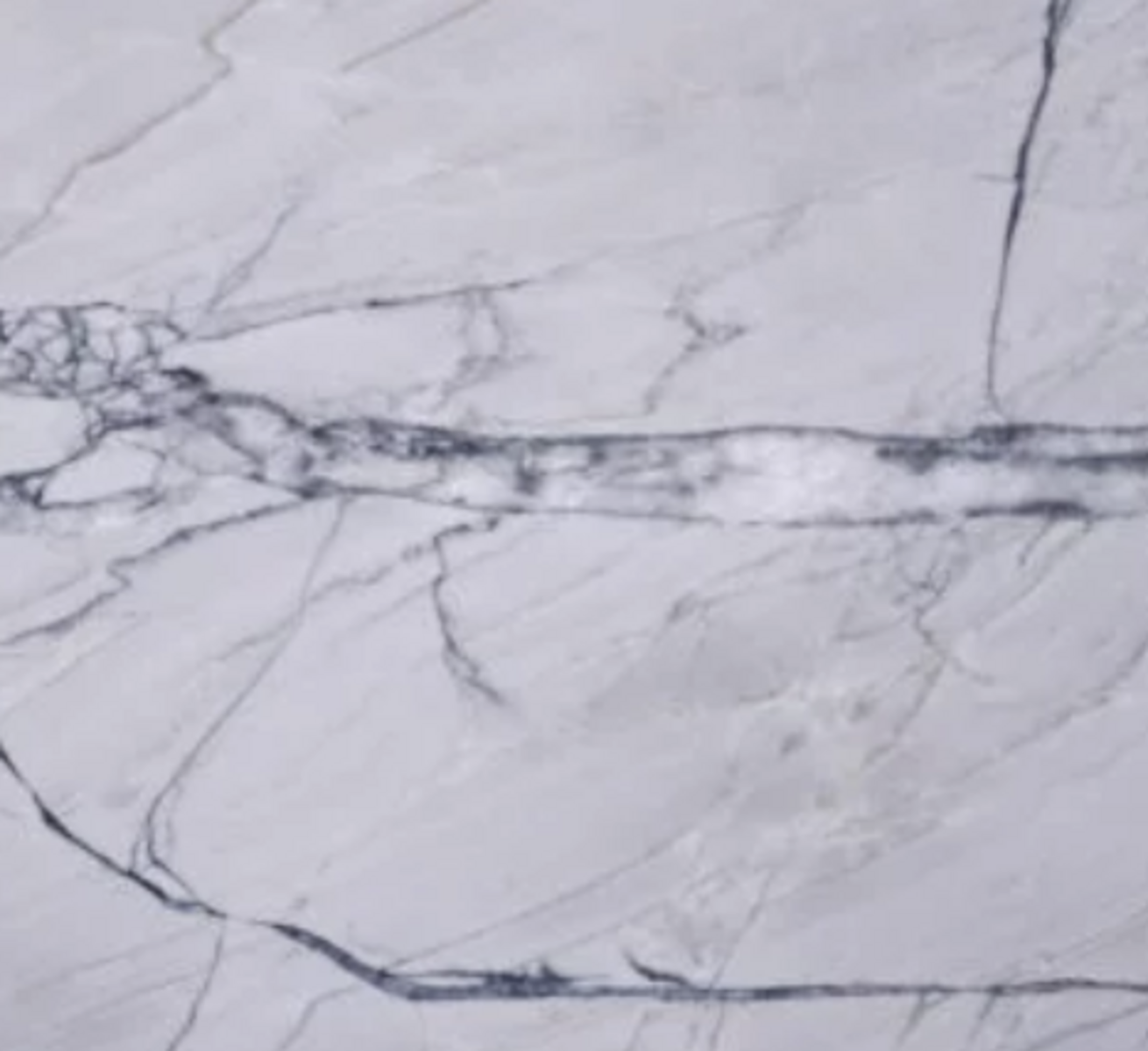 Closeup image of Fantasy Lux White Quartzite countertop slab