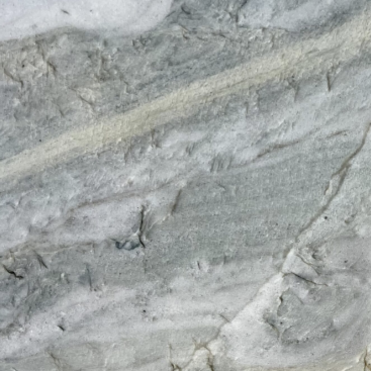 Closeup image of Leblon Premium Cream Quartzite countertop slab