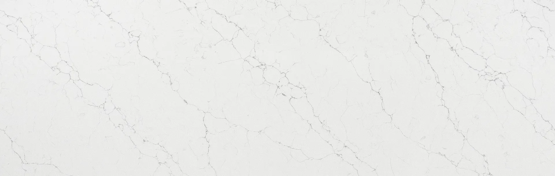 Closeup image of PentalQuartz Avenza White Quartz countertop slab