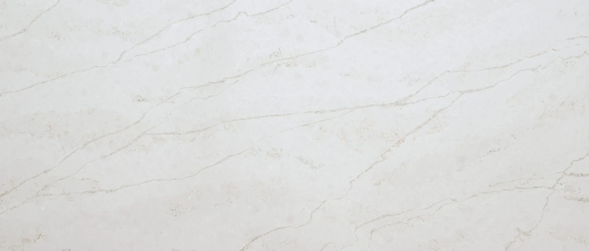 Closeup image of PentalQuartz Elara Cream Quartz countertop slab