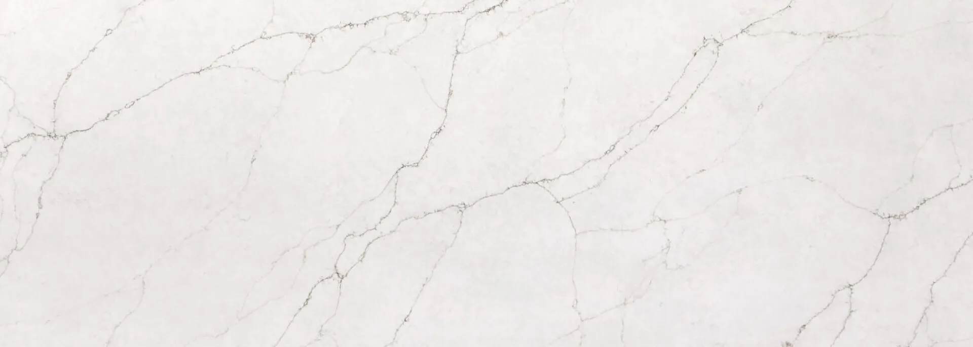Closeup image of PentalQuartz Luce Cascade White Quartz countertop slab