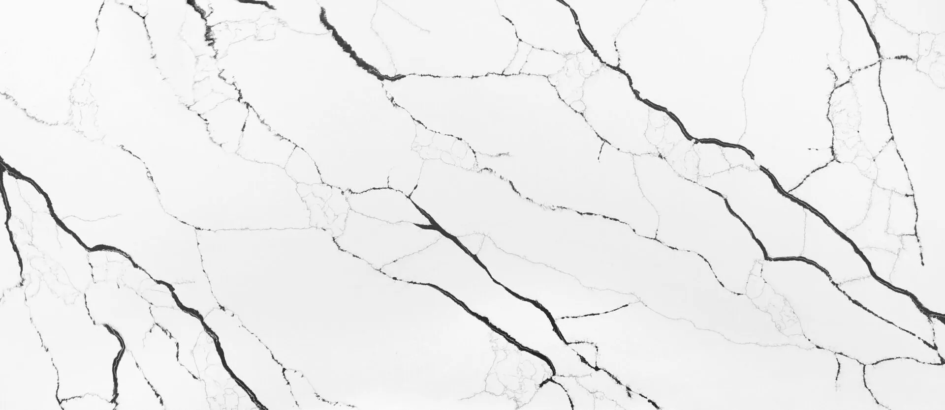 Closeup image of PentalQuartz Lux Noir White Quartz countertop slab