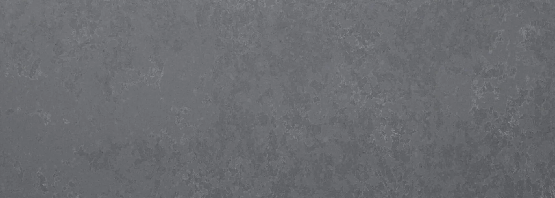 Closeup image of PentalQuartz Midnight Mist Grey Quartz countertop slab