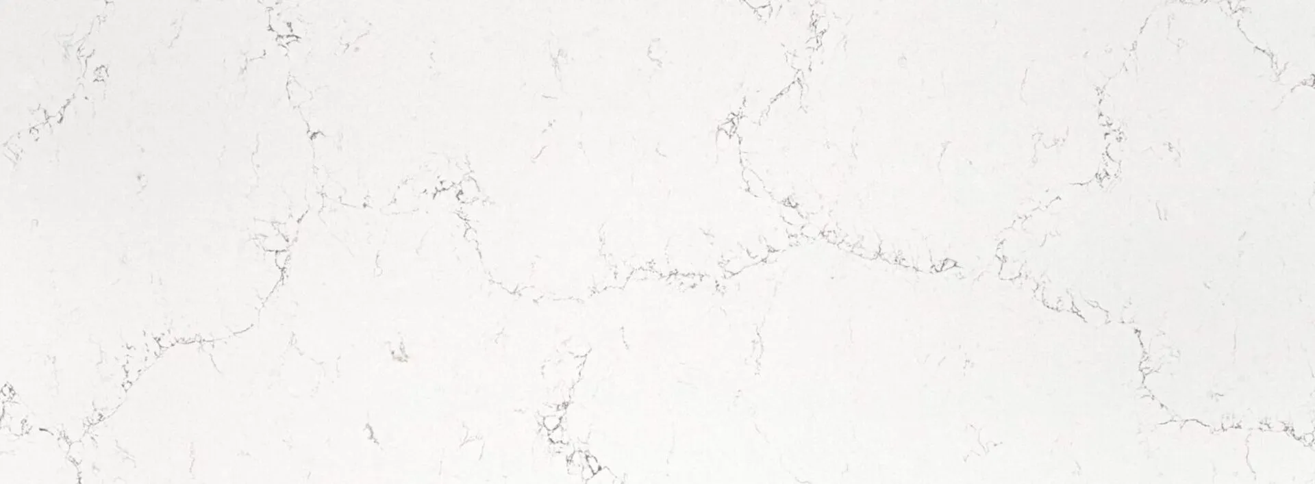 Closeup image of PentalQuartz Mystere White Quartz countertop slab