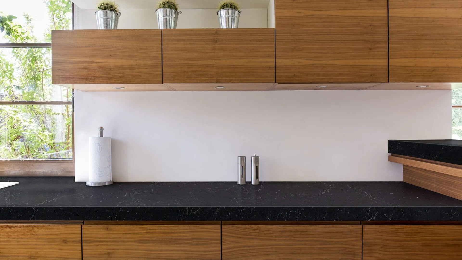 Image of installed PentalQuartz Nightfall Black Quartz countertops