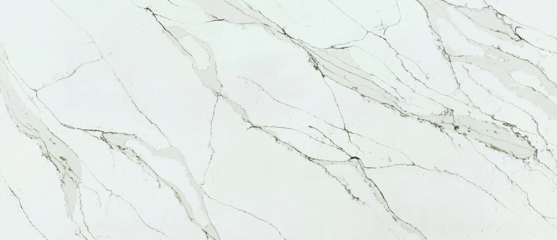 Closeup image of PentalQuartz Unique Calacatta Gold White Quartz countertop slab