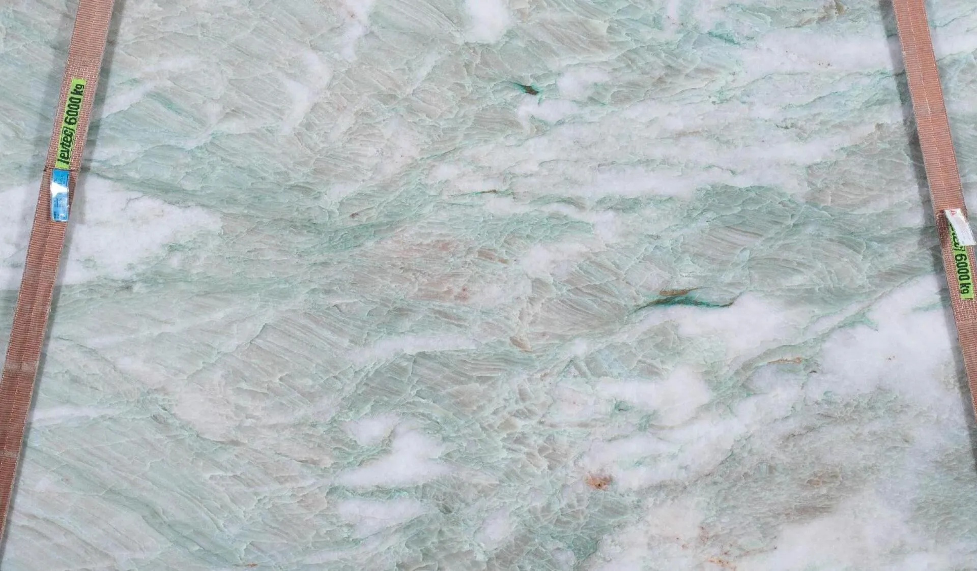 Closeup image of Alexandrita 1st Choice Green Quartzite countertop slab