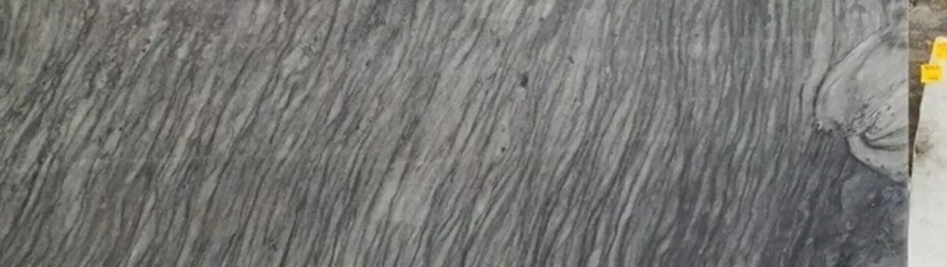 Closeup image of Black Java 1st Choice Grey Quartzite countertop slab
