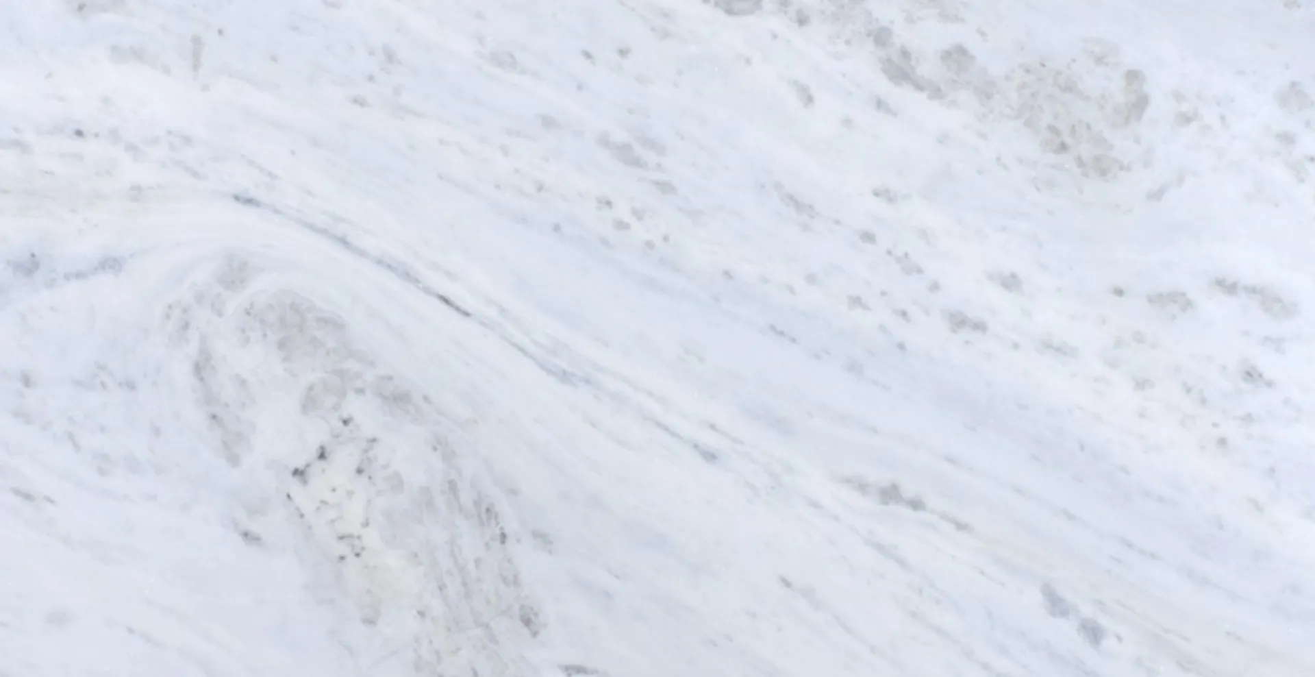 Closeup image of Brazilian Thassos (Bianco Olinda) White Marble countertop slab