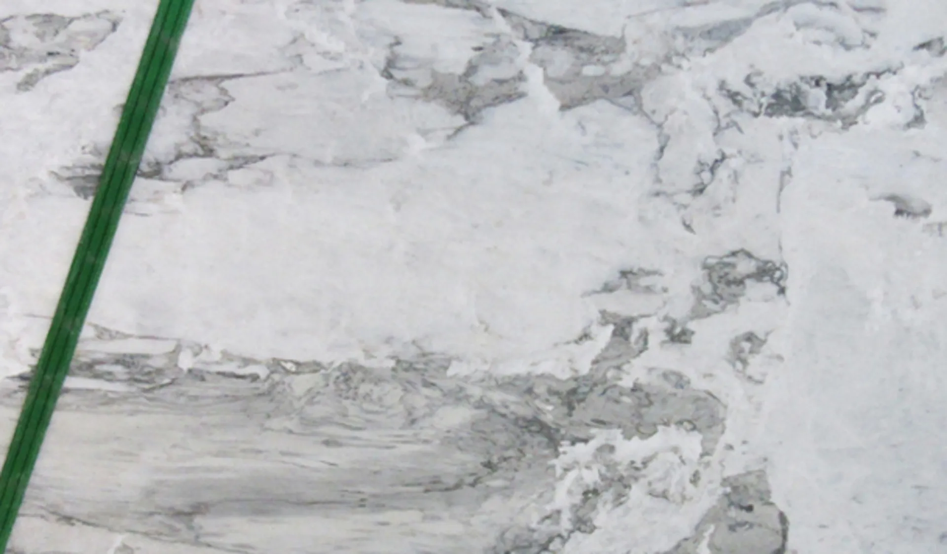 Closeup image of Calacatta Bettogli White Marble countertop slab