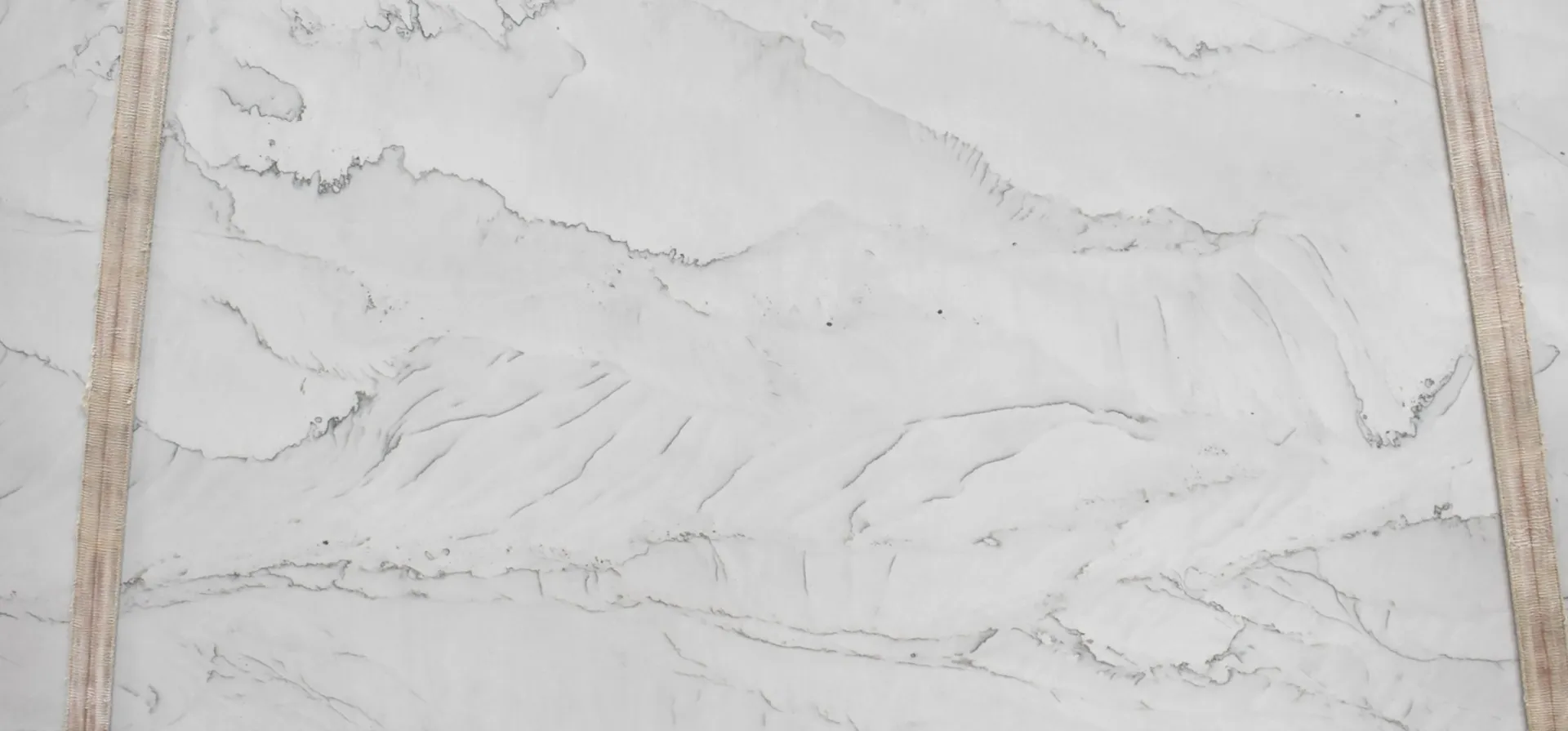 Closeup image of Clair De Lune Grey Quartzite countertop slab