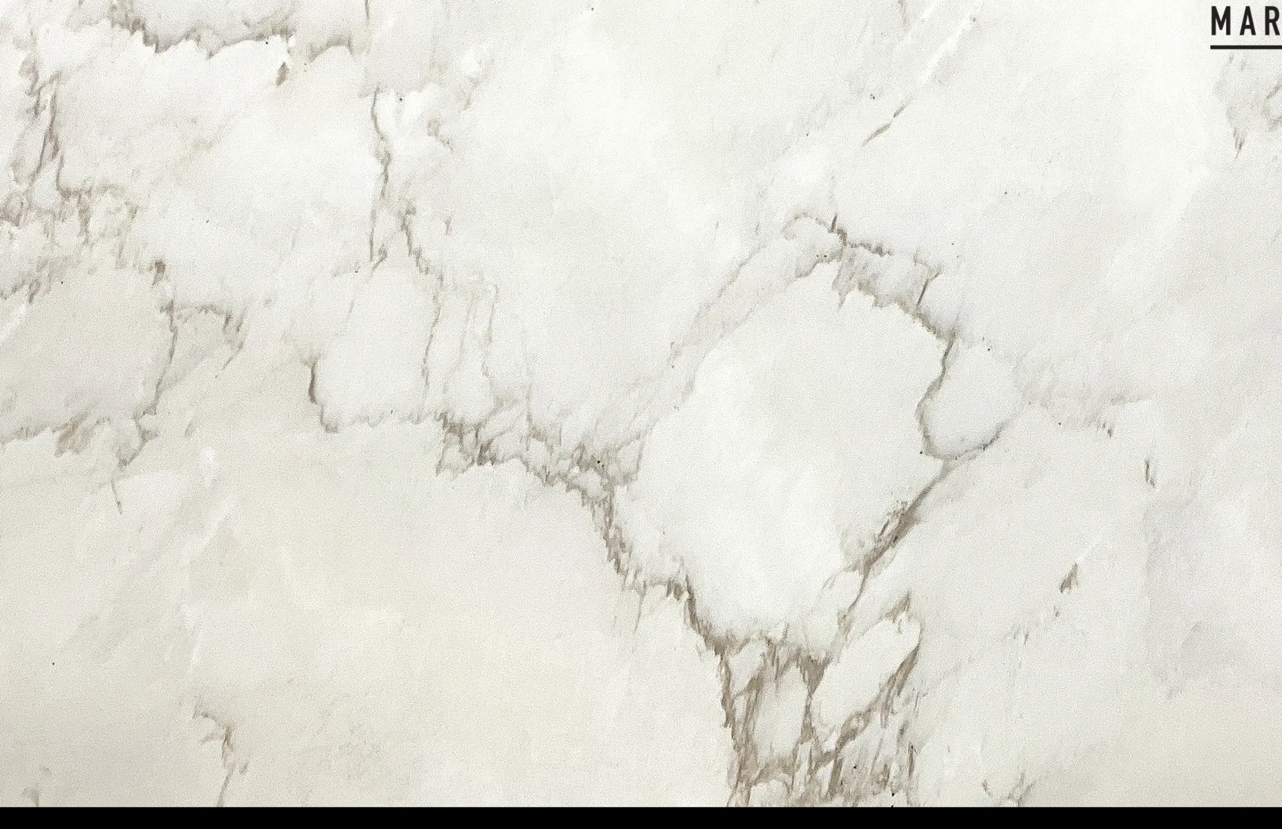 Closeup image of Cremo Delicato Extra White Marble countertop slab