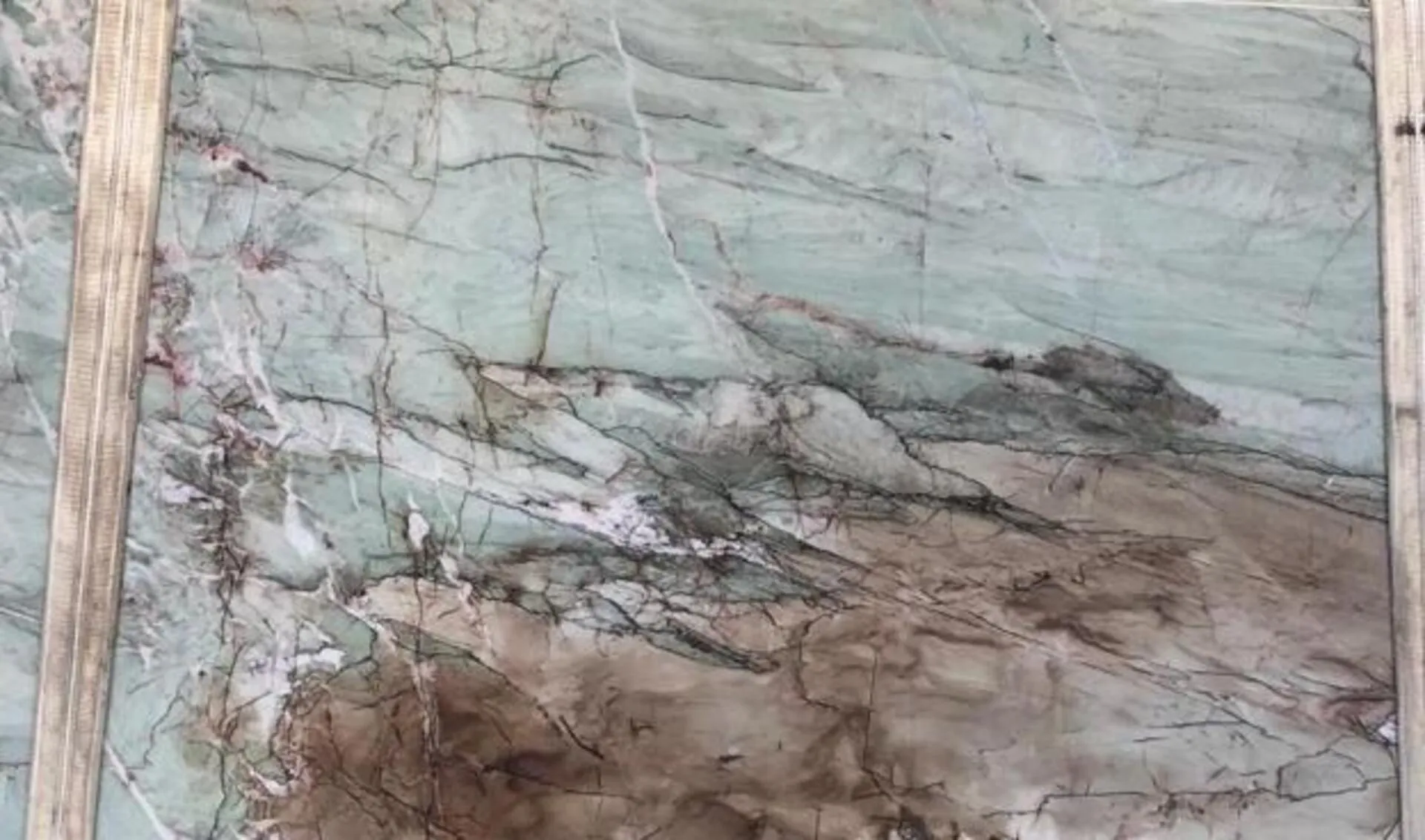 Closeup image of Crystal Acqua 1st Choice Green Quartzite countertop slab