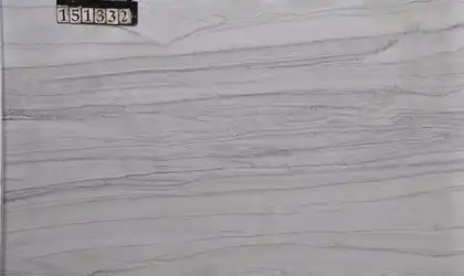 Closeup image of Ivory Macaubas 1st Choice Grey Quartzite countertop slab