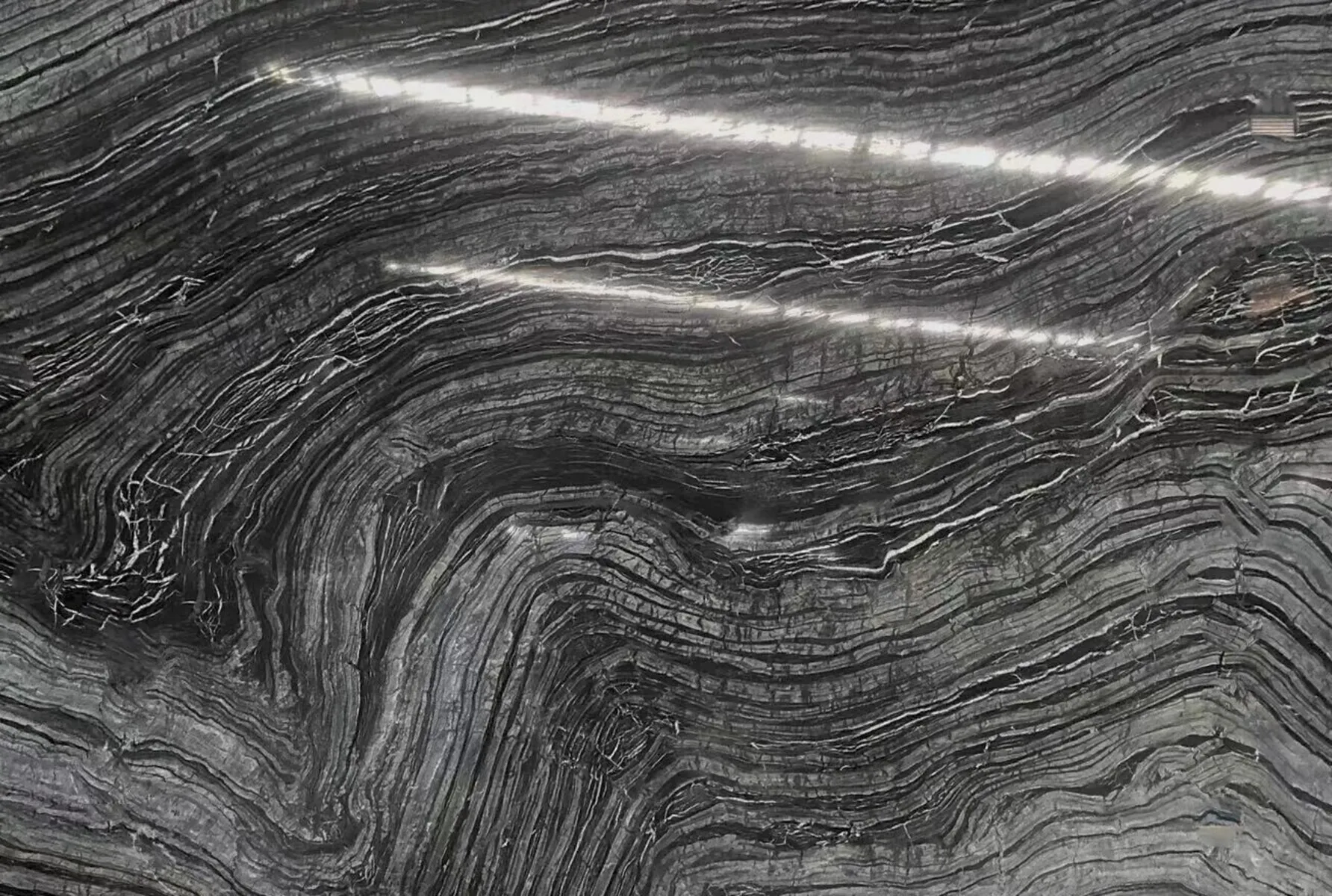 Closeup image of Kenya Black Black Marble countertop slab