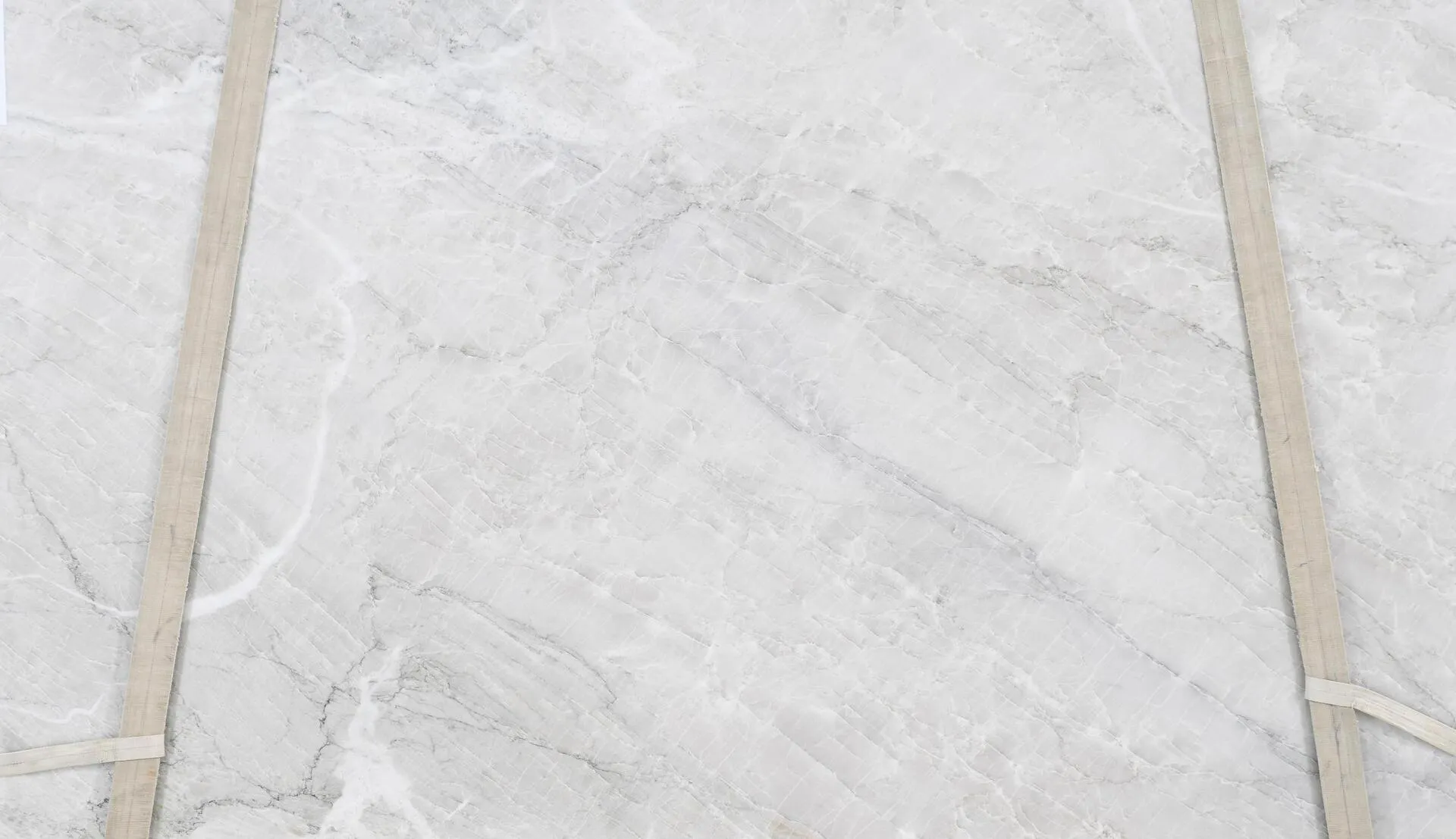 Closeup image of Perla Bianca Extra White Quartzite countertop slab