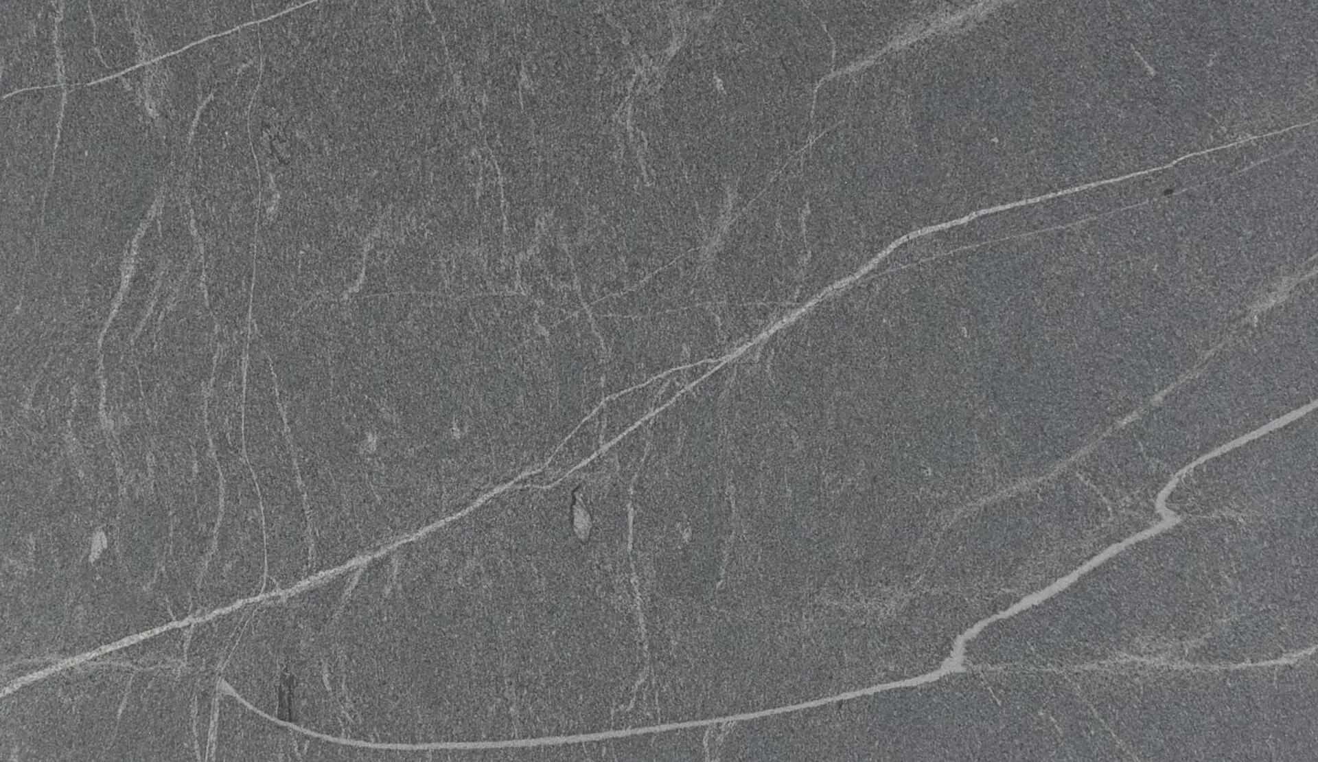 Closeup image of Saratoga Silver Grey Granite countertop slab