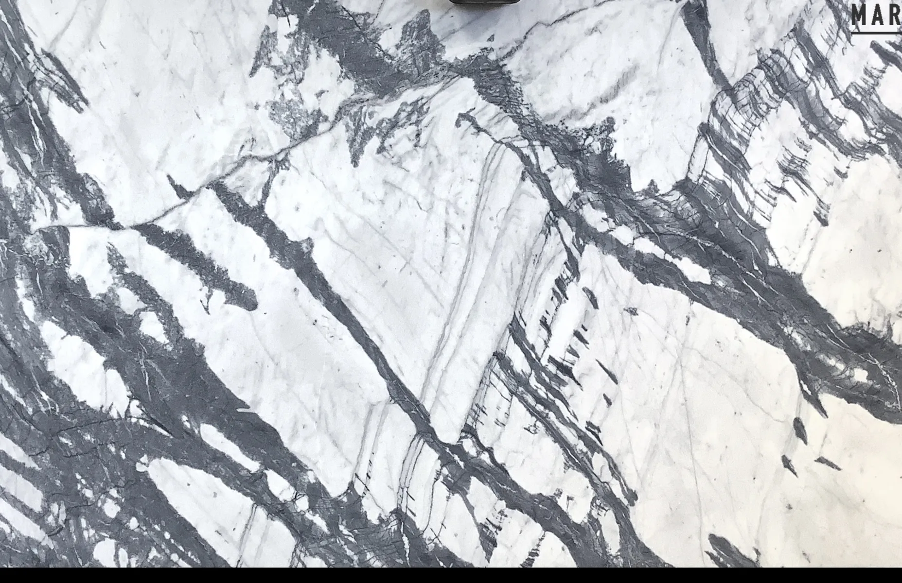 Closeup image of Shadow Grey White Marble countertop slab