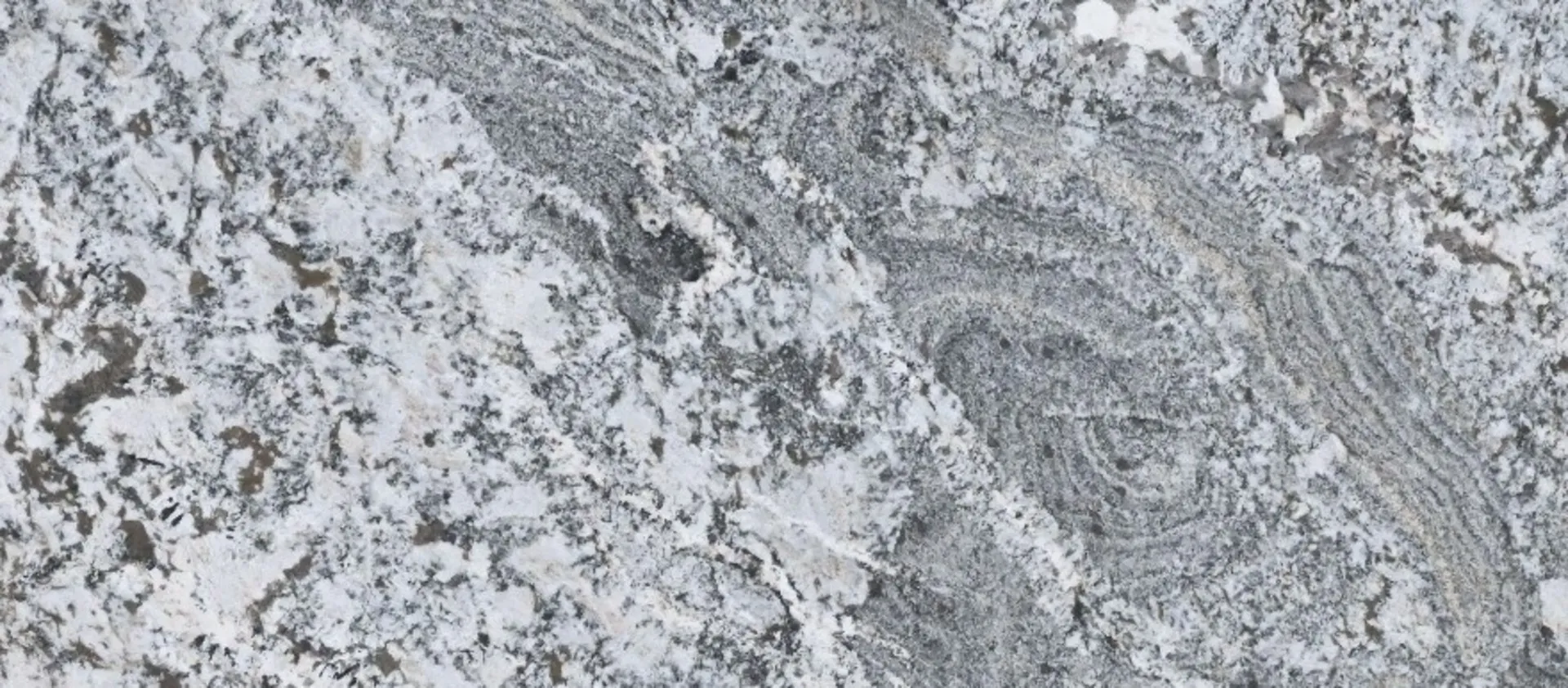 Closeup image of White Nuvo Grey Granite countertop slab