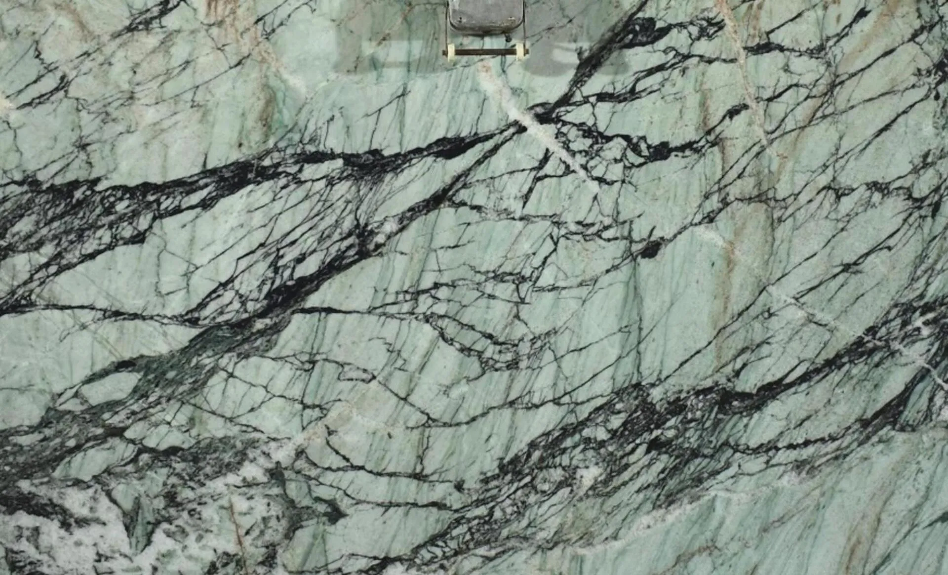 Closeup image of Alexandrita 1st Choice Green Quartzite countertop slab